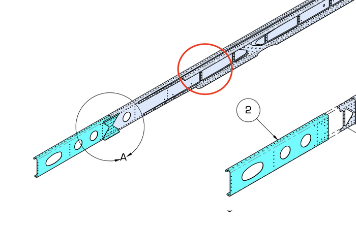 The area that may have the reinforcing angle misalignment can be found on the top of the main spar, a few rivet holes inboard from where the aft J-section spar reinforcement ends (red circle).